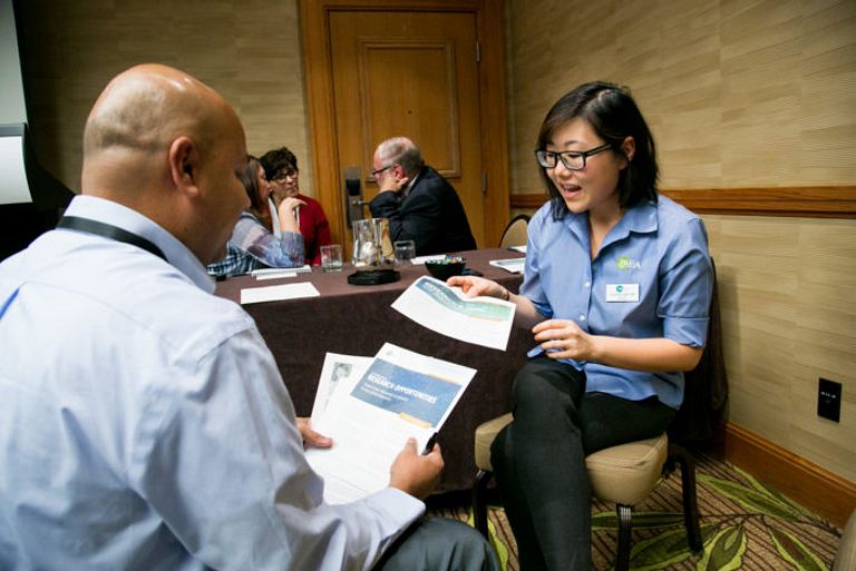 PA staff interact with members.
