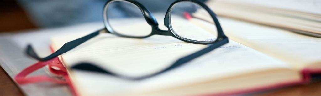 glasses on a book